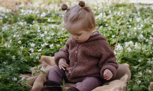 Waarom wollen babykleding perfect is voor jouw kleintje