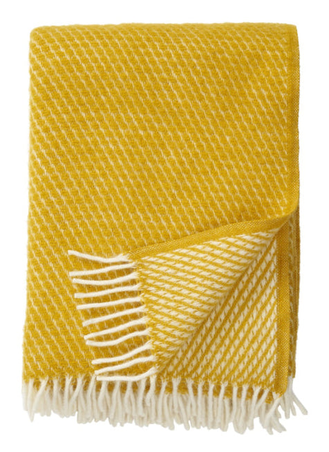 Klippan - Velvet | plaid van lamswol Saffron 130x200 cm.