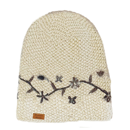 Planet wool - Long flower hat | wollen muts met bloemen Off-white black flowers